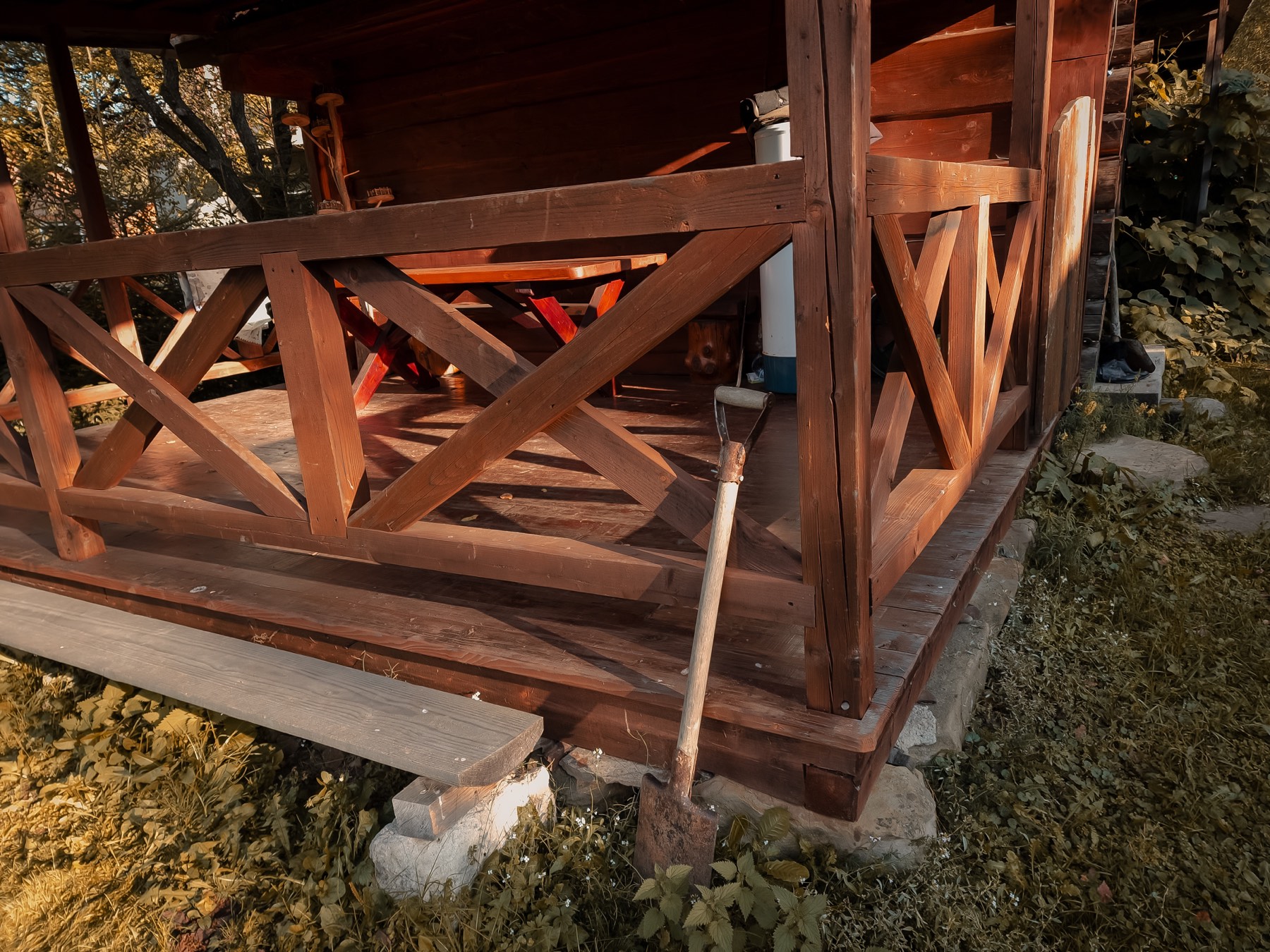 Completed wooden deck project with railing