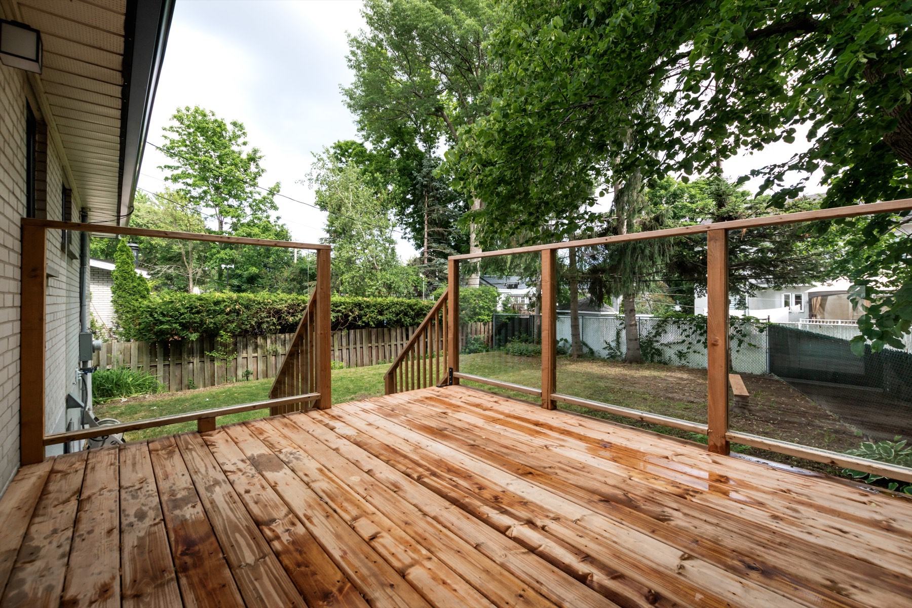 Residential deck with wood railing