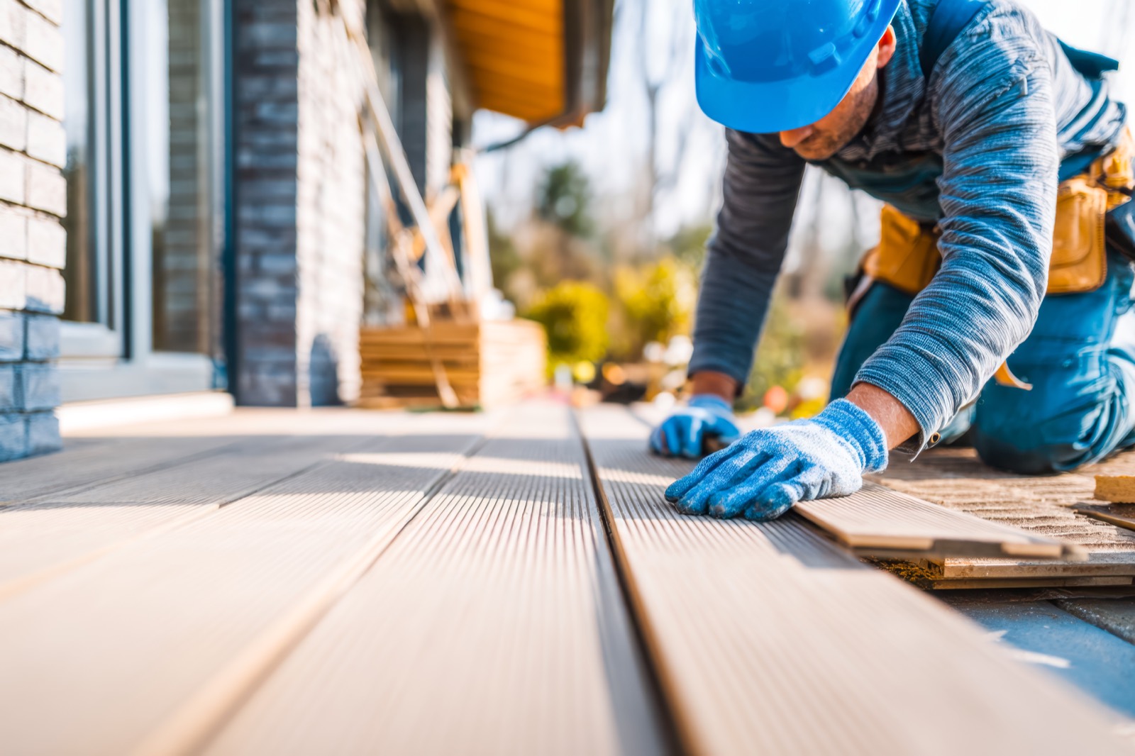 Composite deck service with durable low-maintenance materials